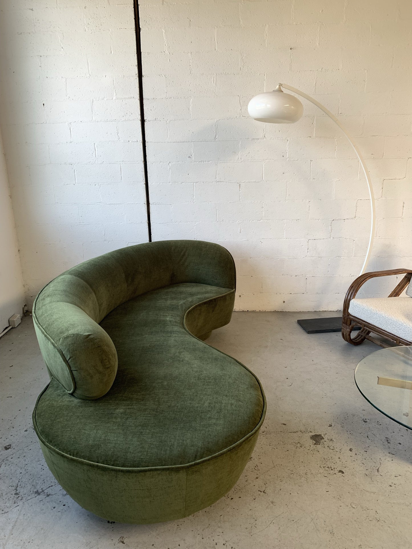 Curved Velvet Sofa in Deep Botanical Green