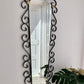 French Curved Iron and Brass Mirror
