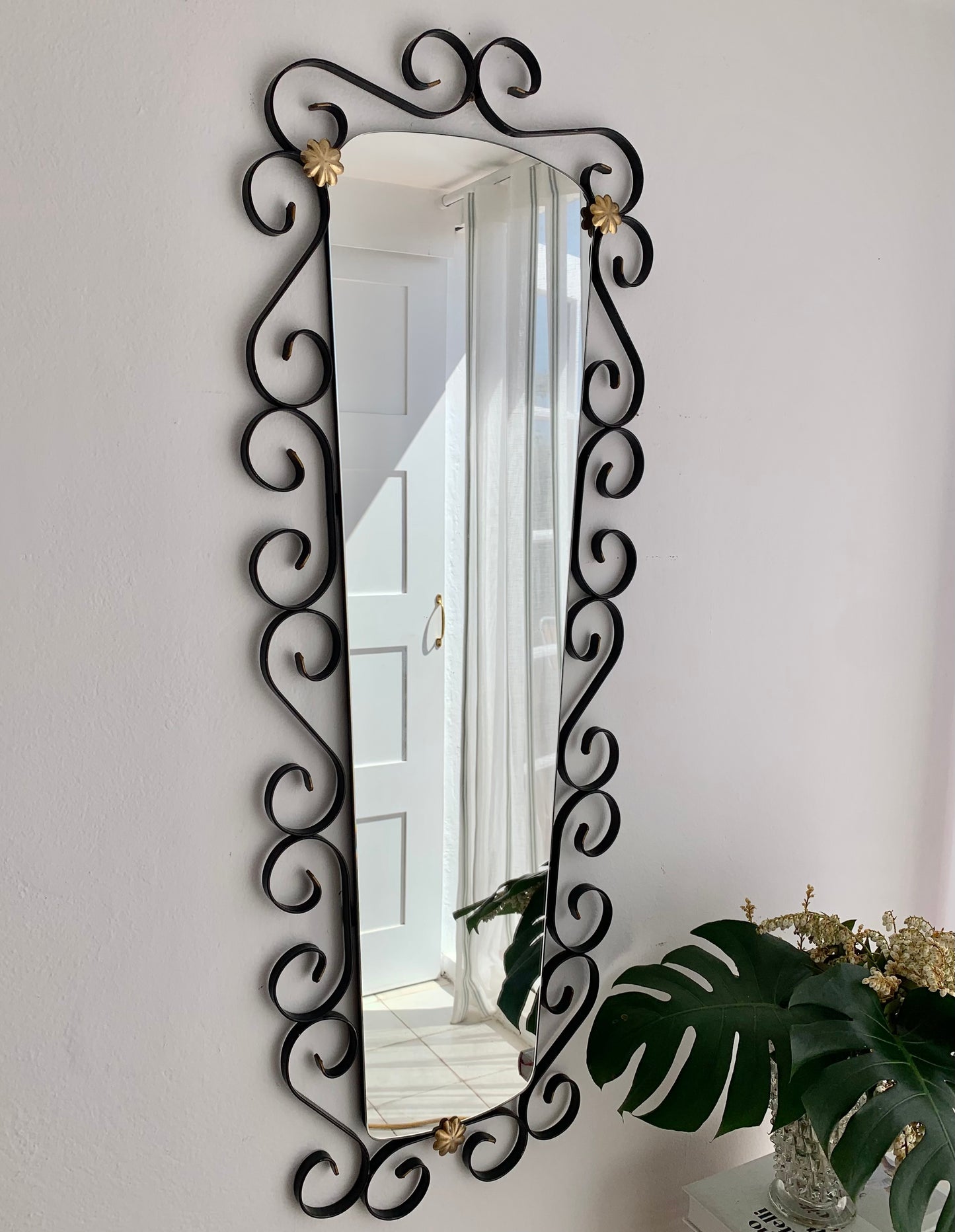 French Curved Iron and Brass Mirror