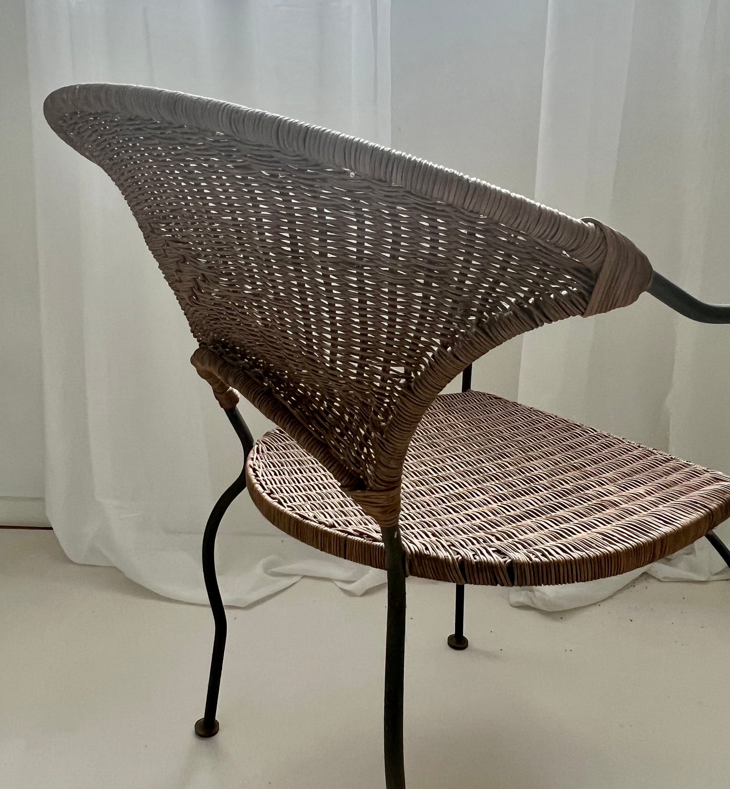- Curvy Iron and Cane Armchair