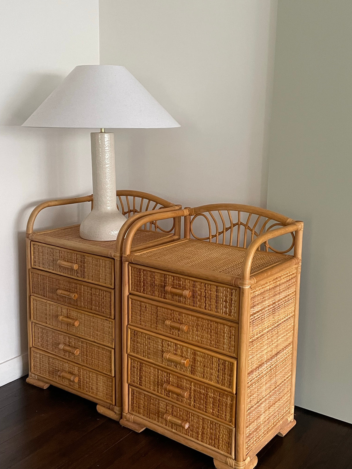 Pair of vintage cane bedside tables