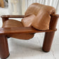 - Pacific Green Tan Leather Armchair