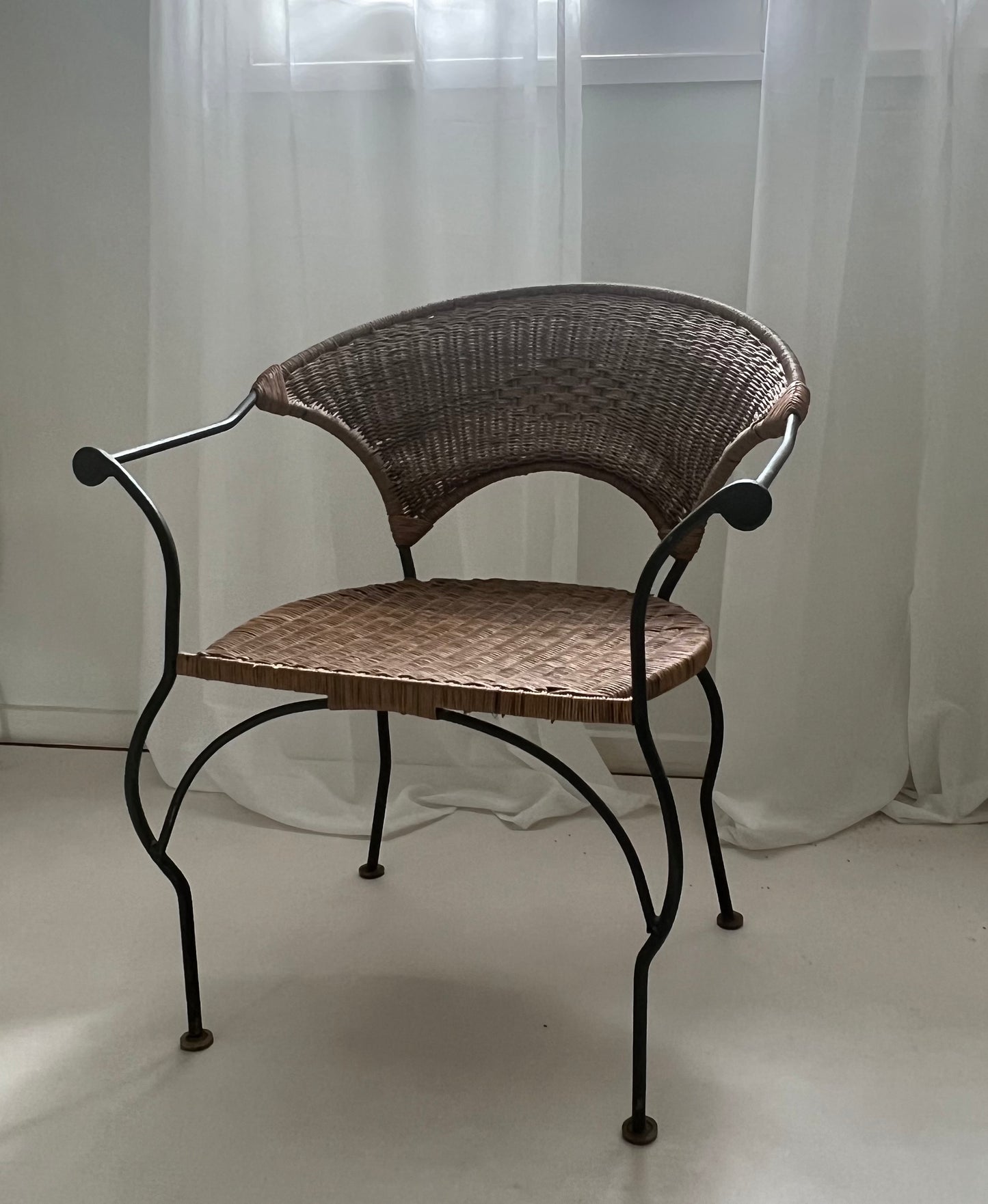 - Curvy Iron and Cane Armchair