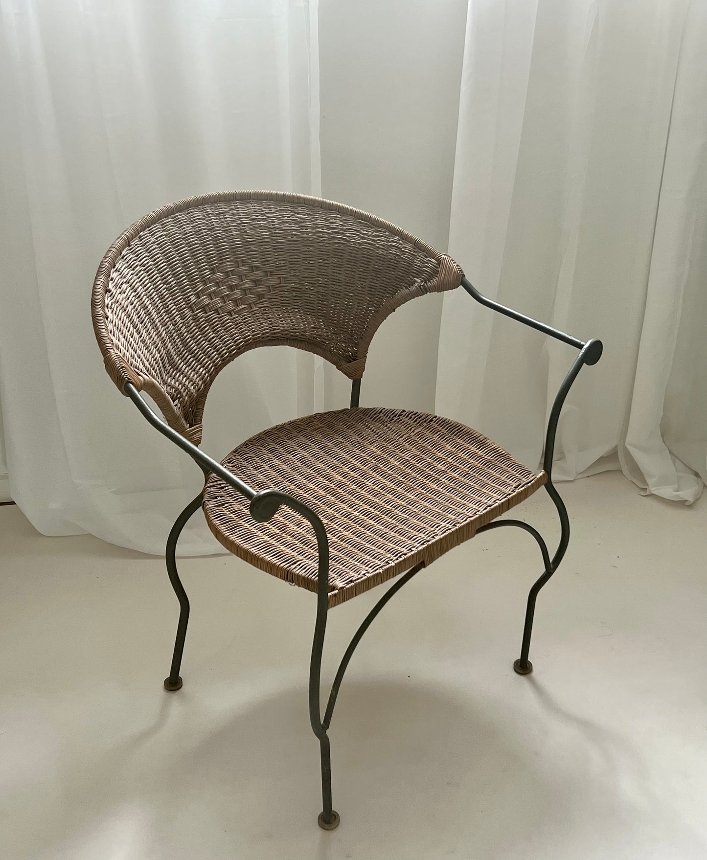 - Curvy Iron and Cane Armchair