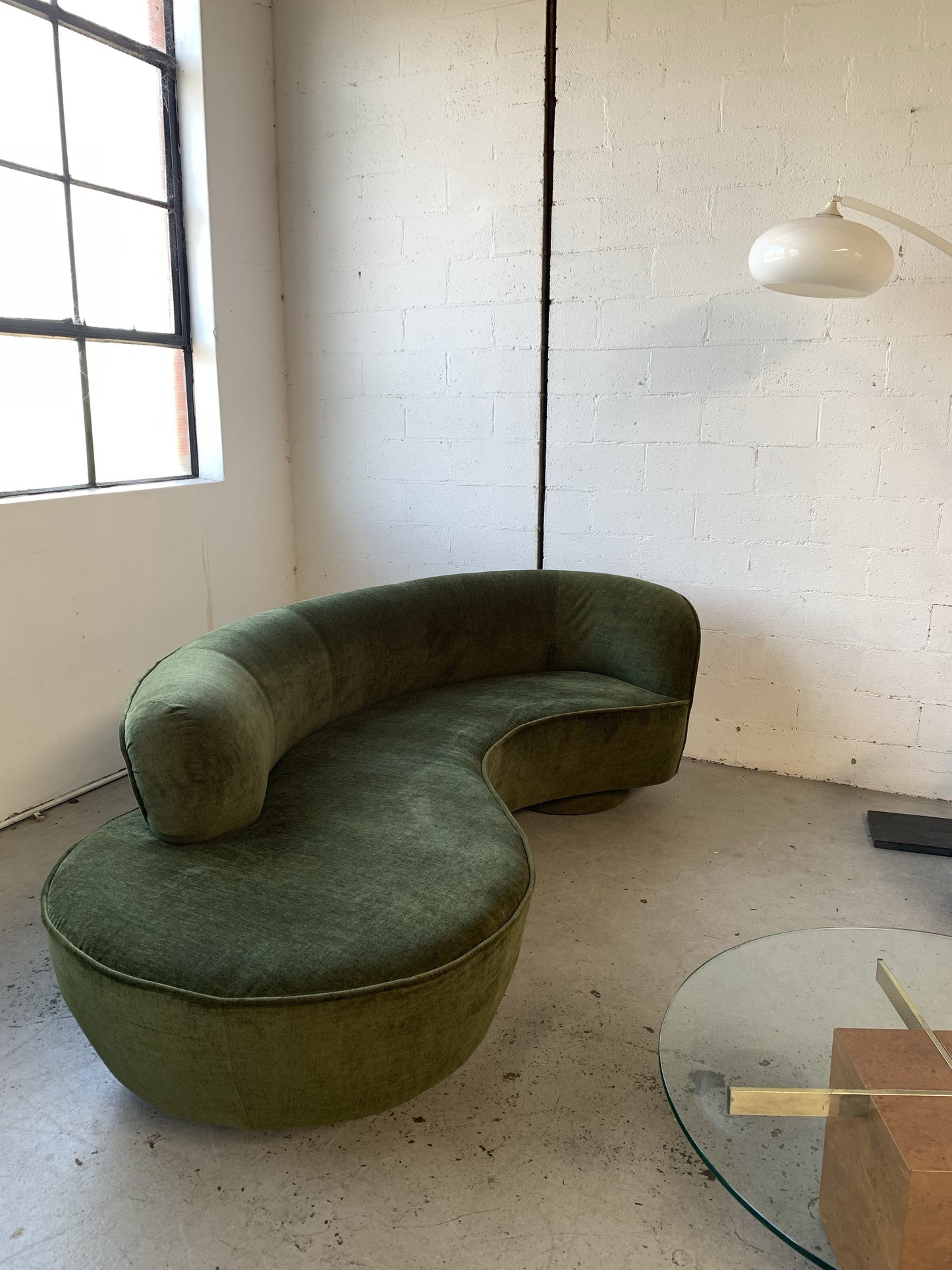 Curved Velvet Sofa in Deep Botanical Green