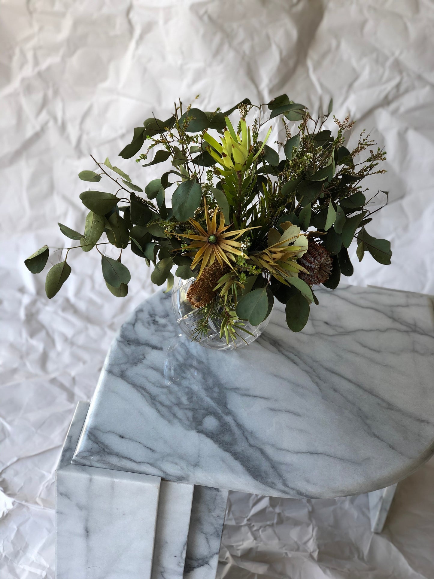 Polished Carrara marble side table