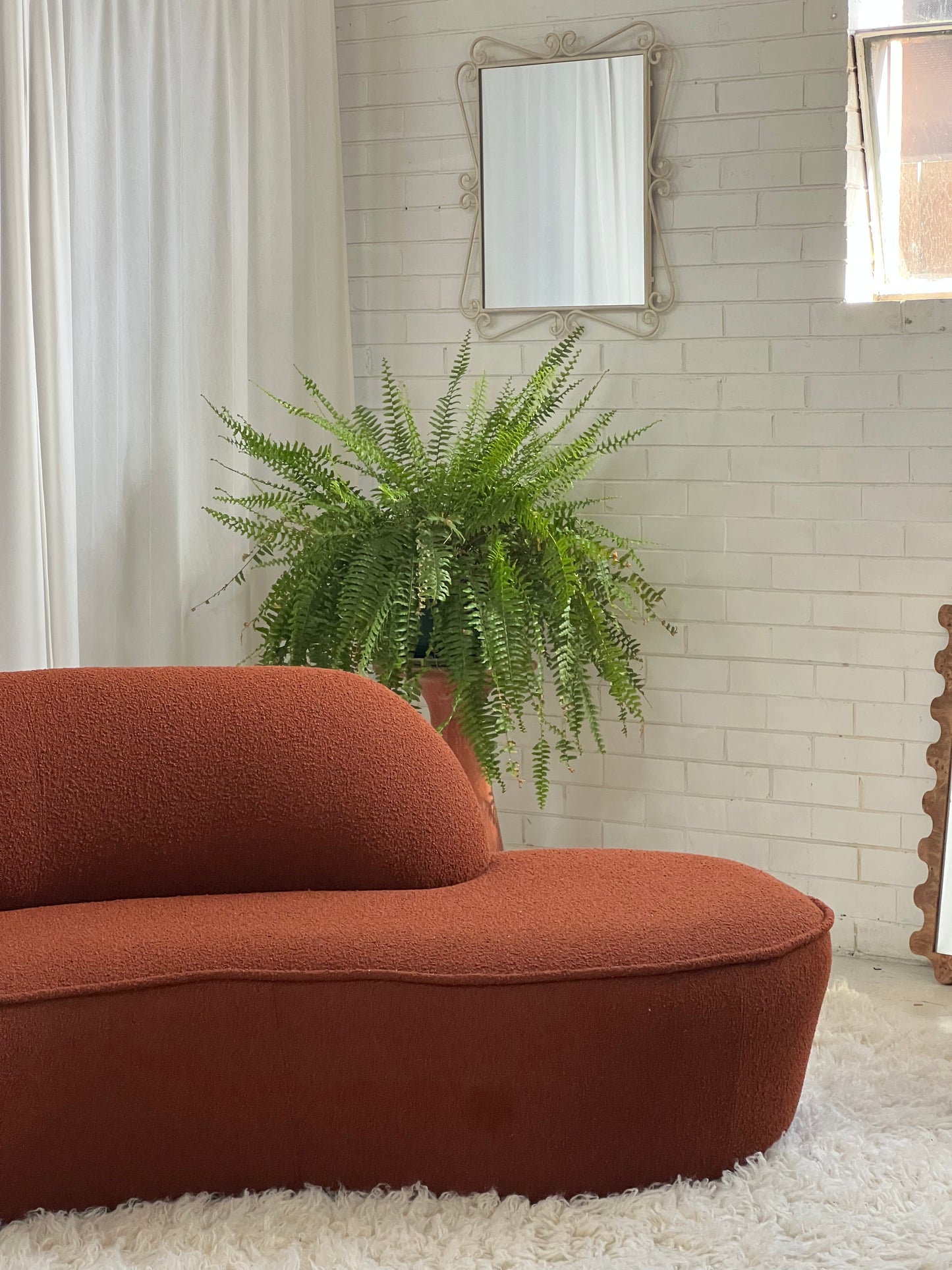 - Bespoke Rust Boucle Curved Sofa