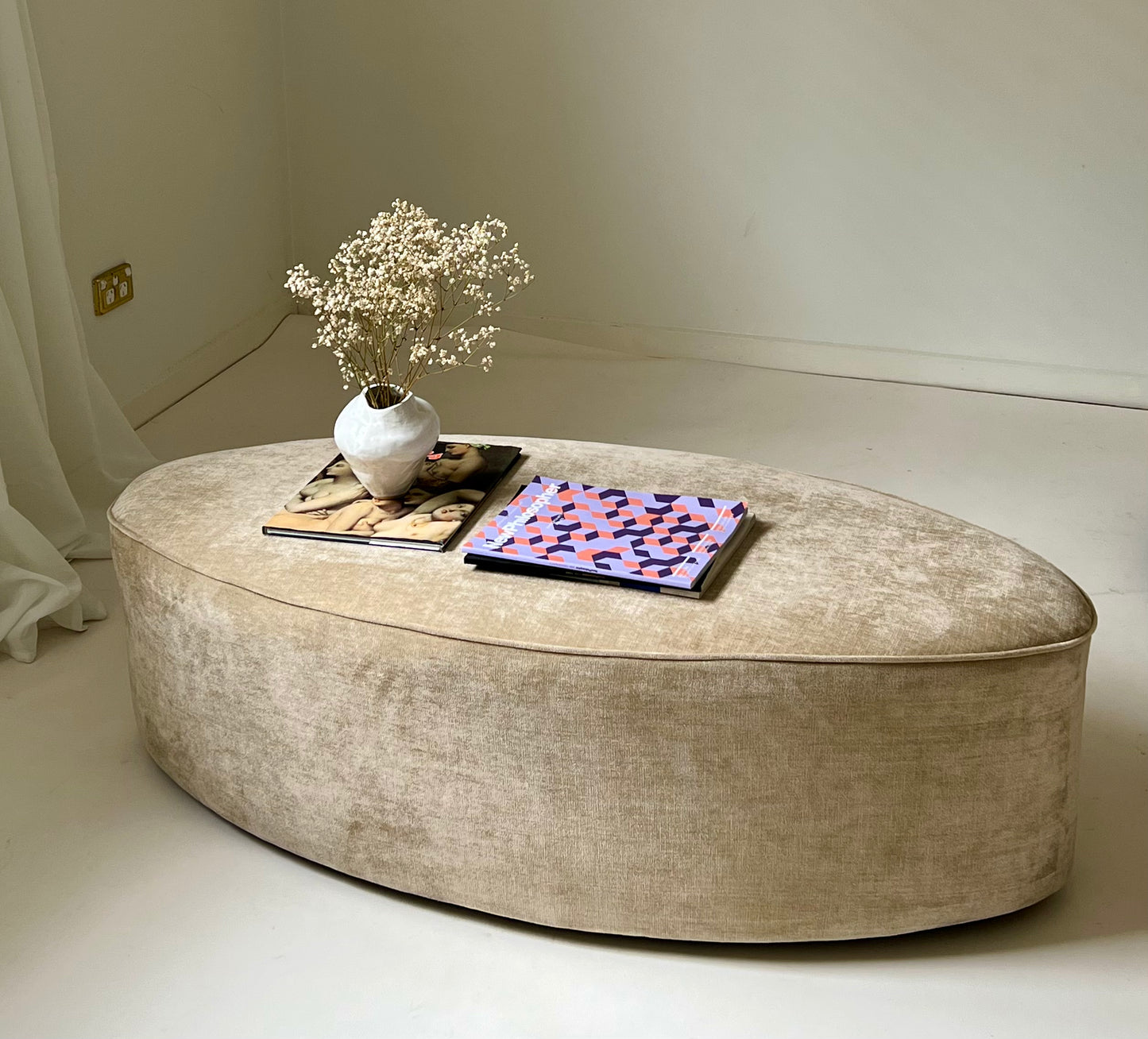 - Curved Ottoman in Cashew Velvet