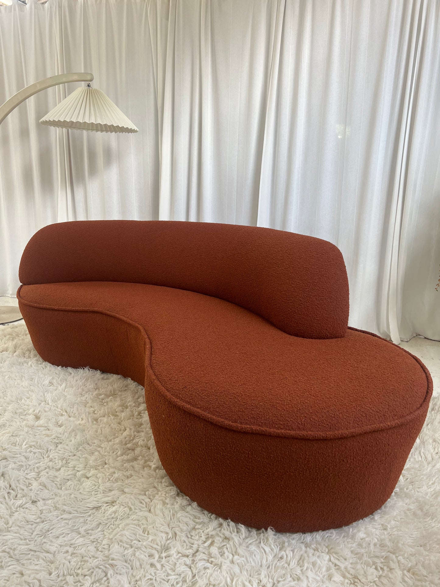 - Bespoke Rust Boucle Curved Sofa