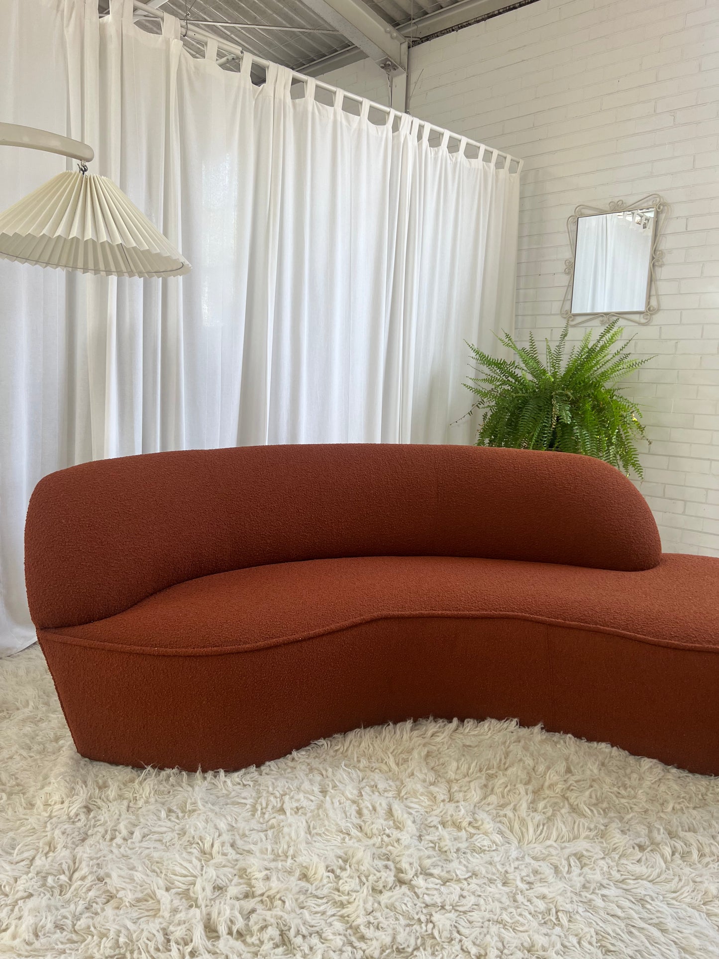 - Bespoke Rust Boucle Curved Sofa