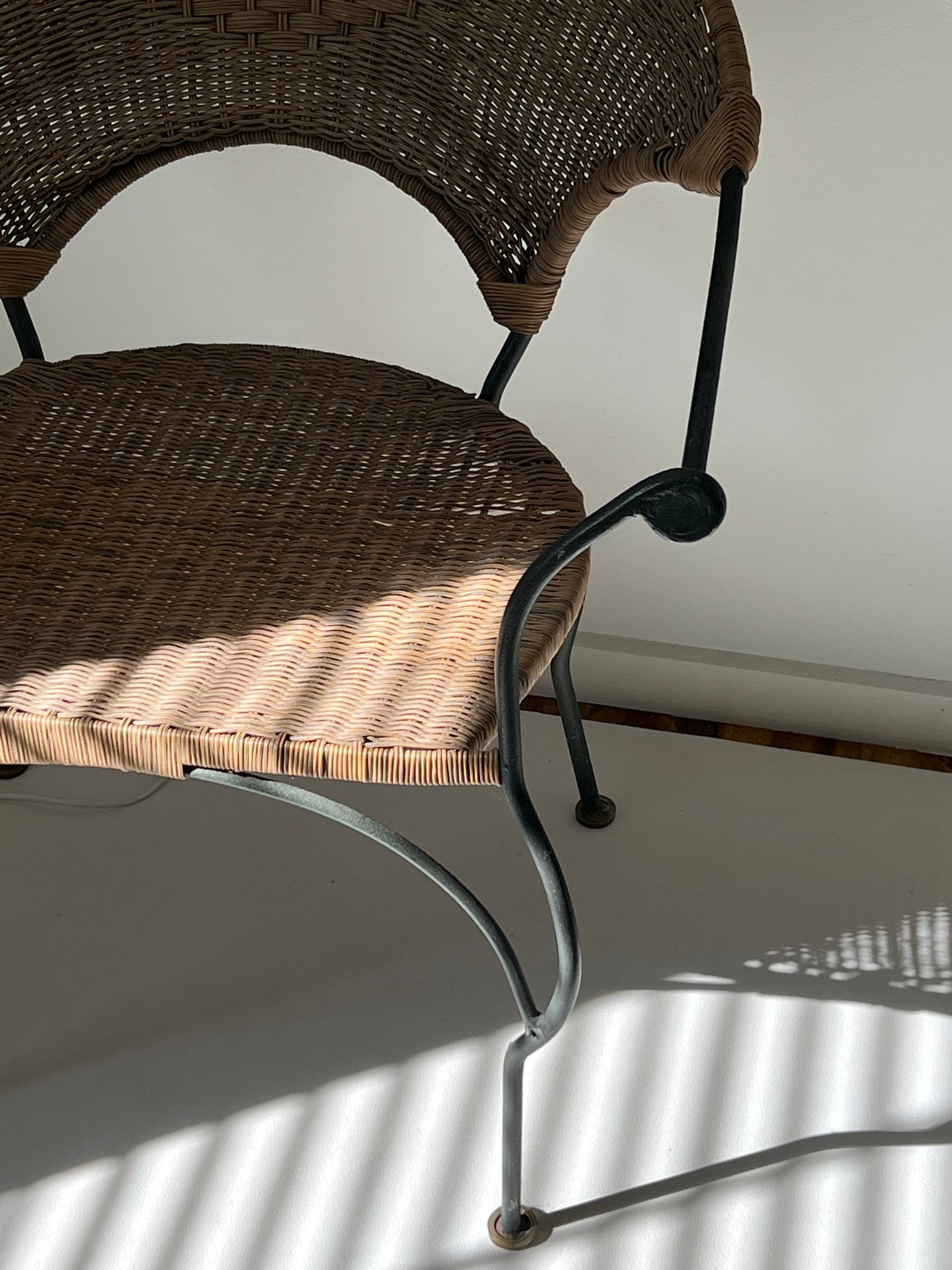 - Curvy Iron and Cane Armchair