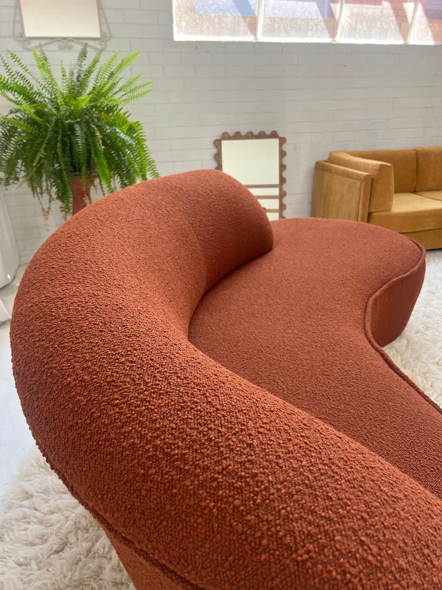 - Bespoke Rust Boucle Curved Sofa