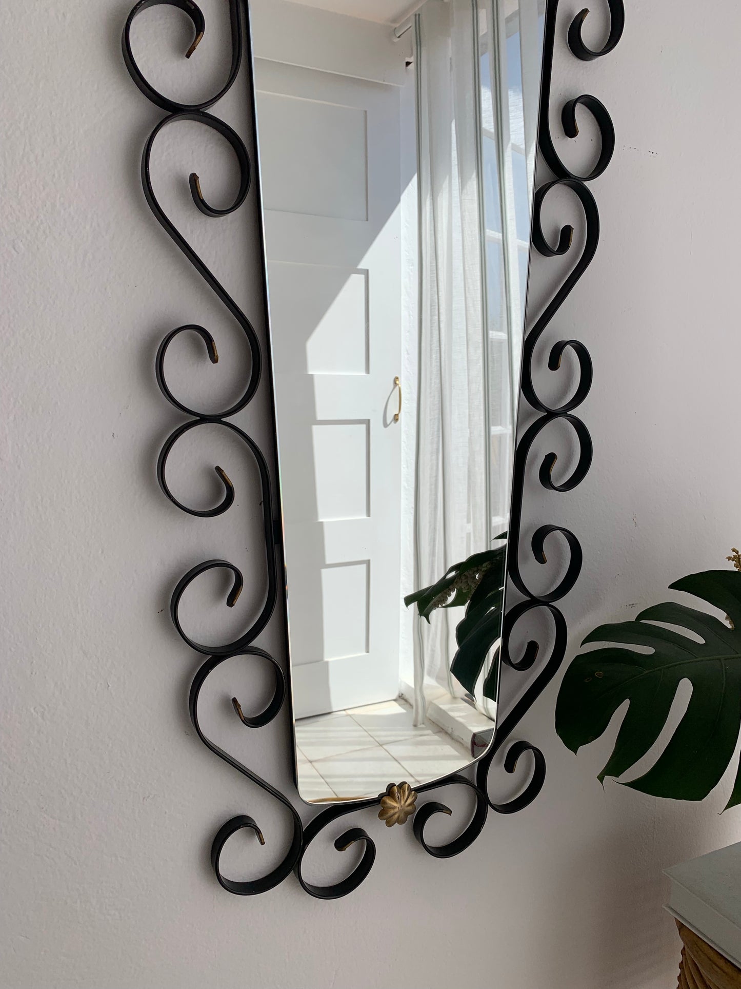 French Curved Iron and Brass Mirror