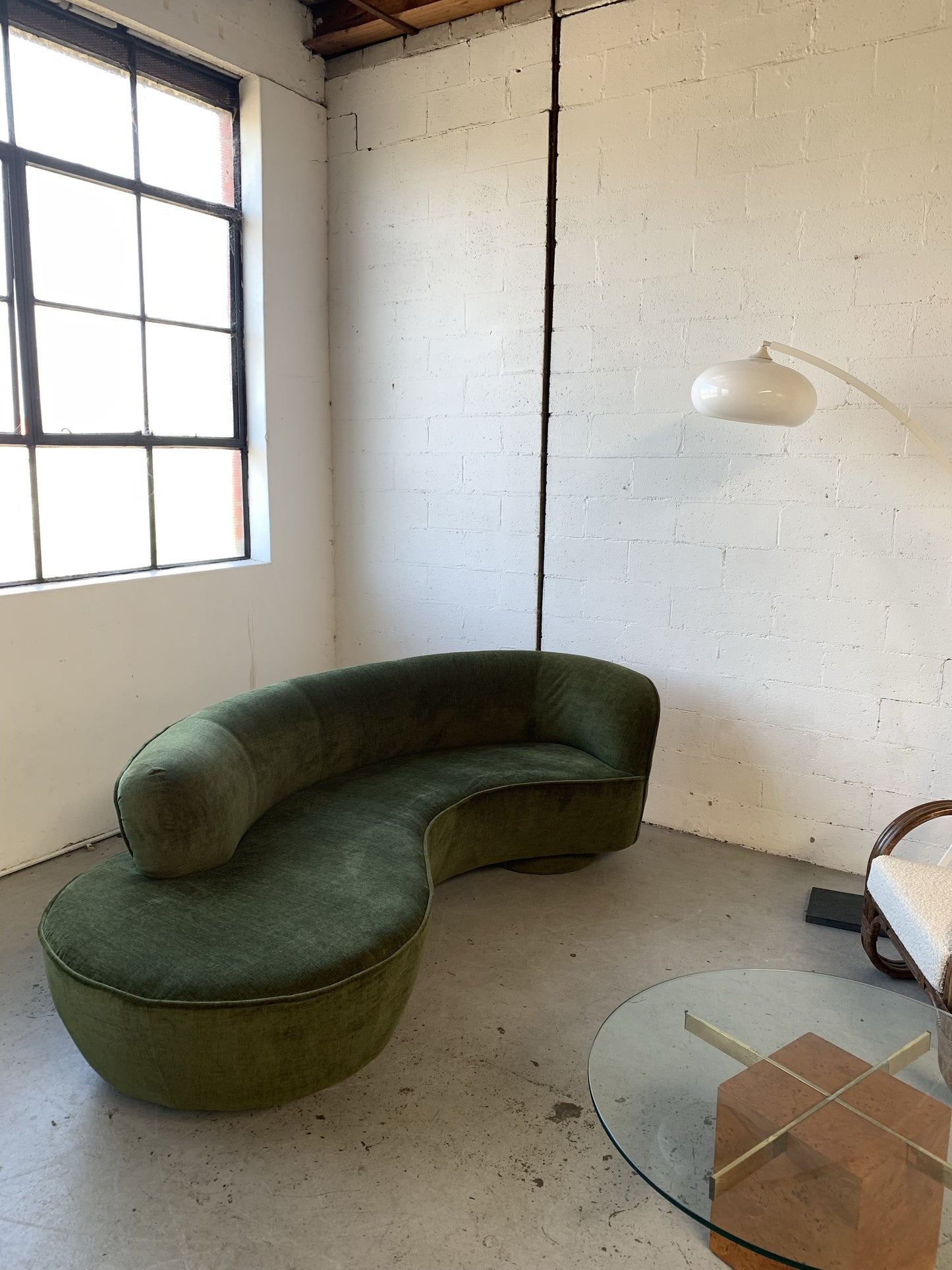 Curved Velvet Sofa in Deep Botanical Green