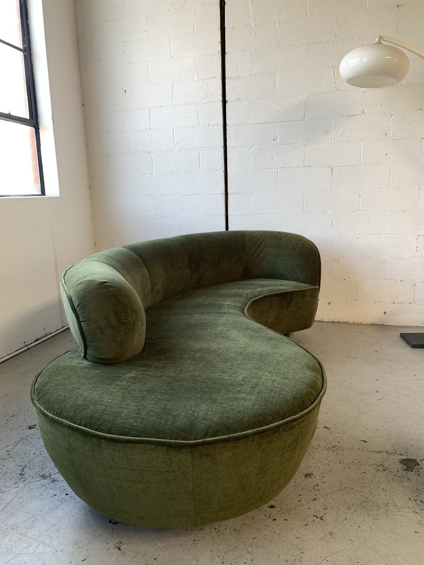 Curved Velvet Sofa in Deep Botanical Green