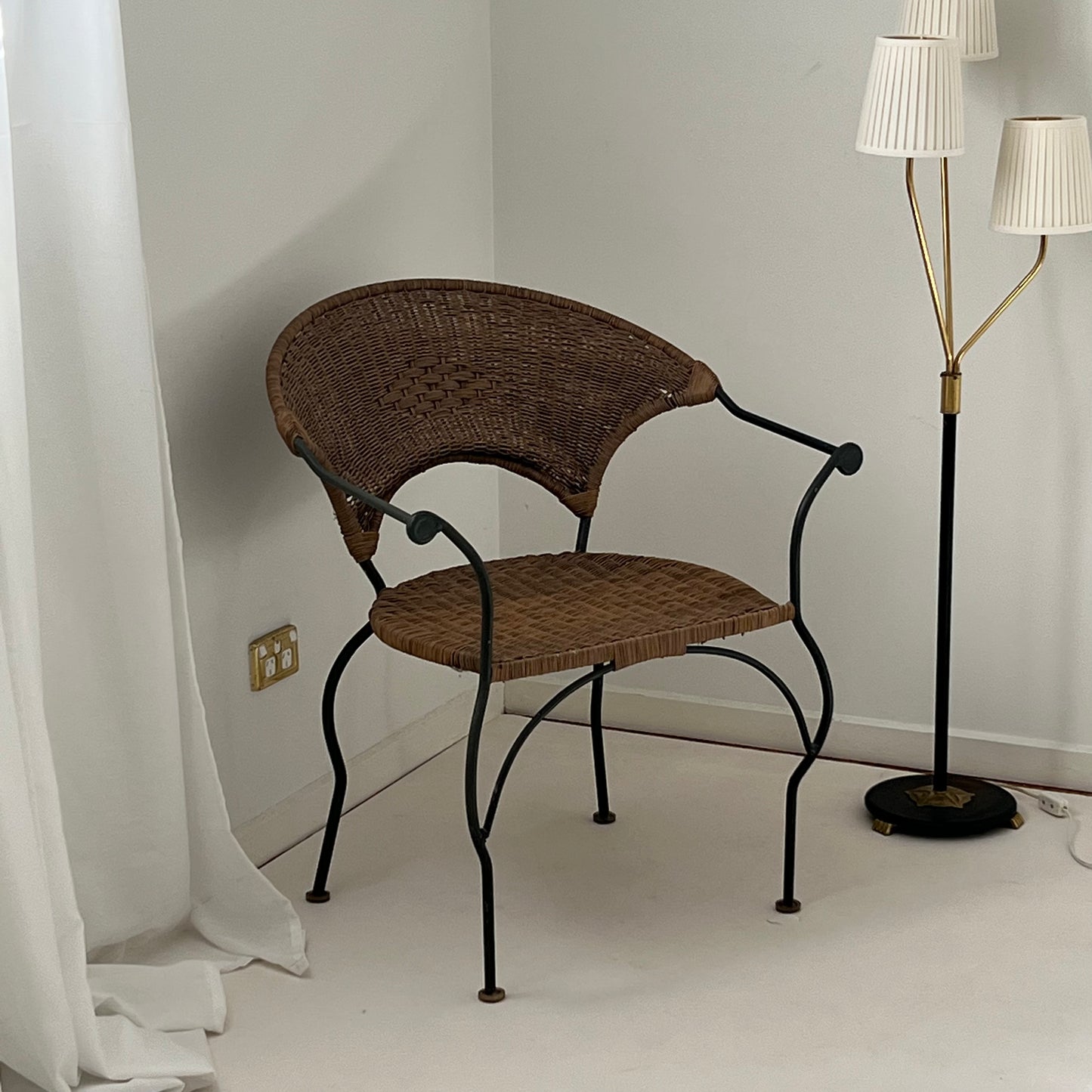 - Curvy Iron and Cane Armchair