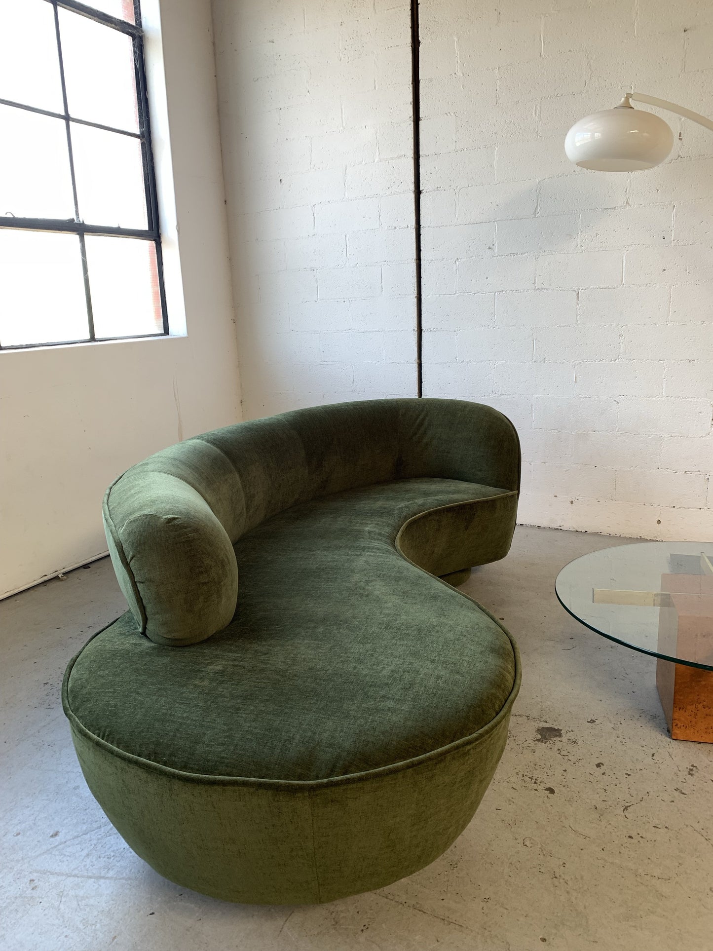 Curved Velvet Sofa in Deep Botanical Green