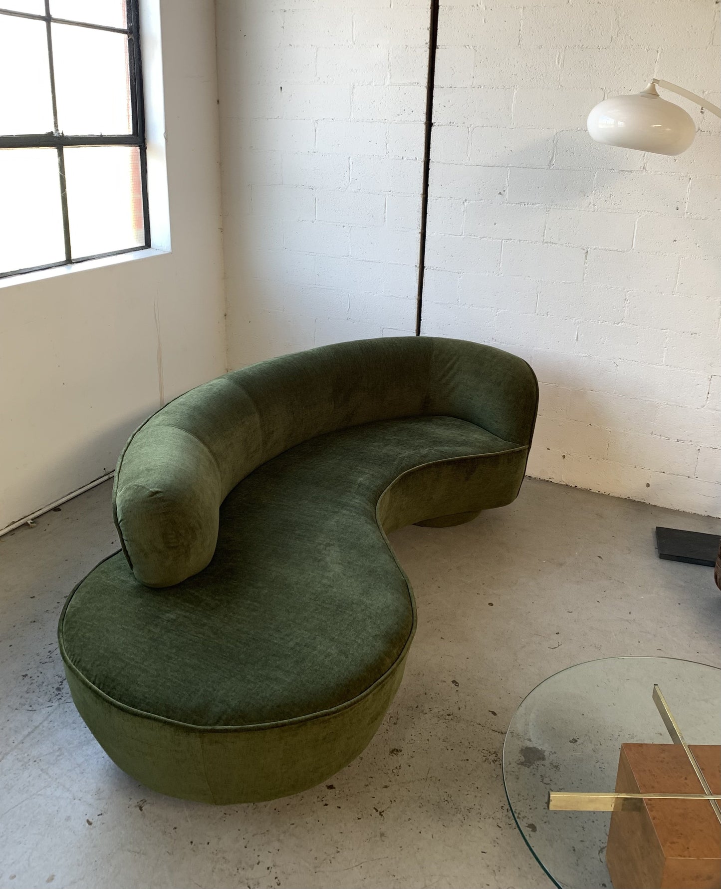 Curved Velvet Sofa in Deep Botanical Green