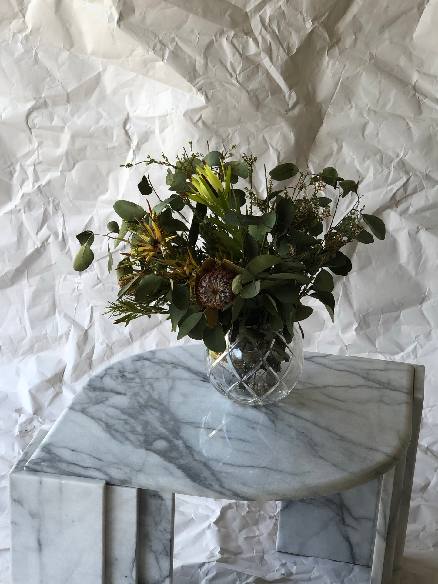Polished Carrara marble side table