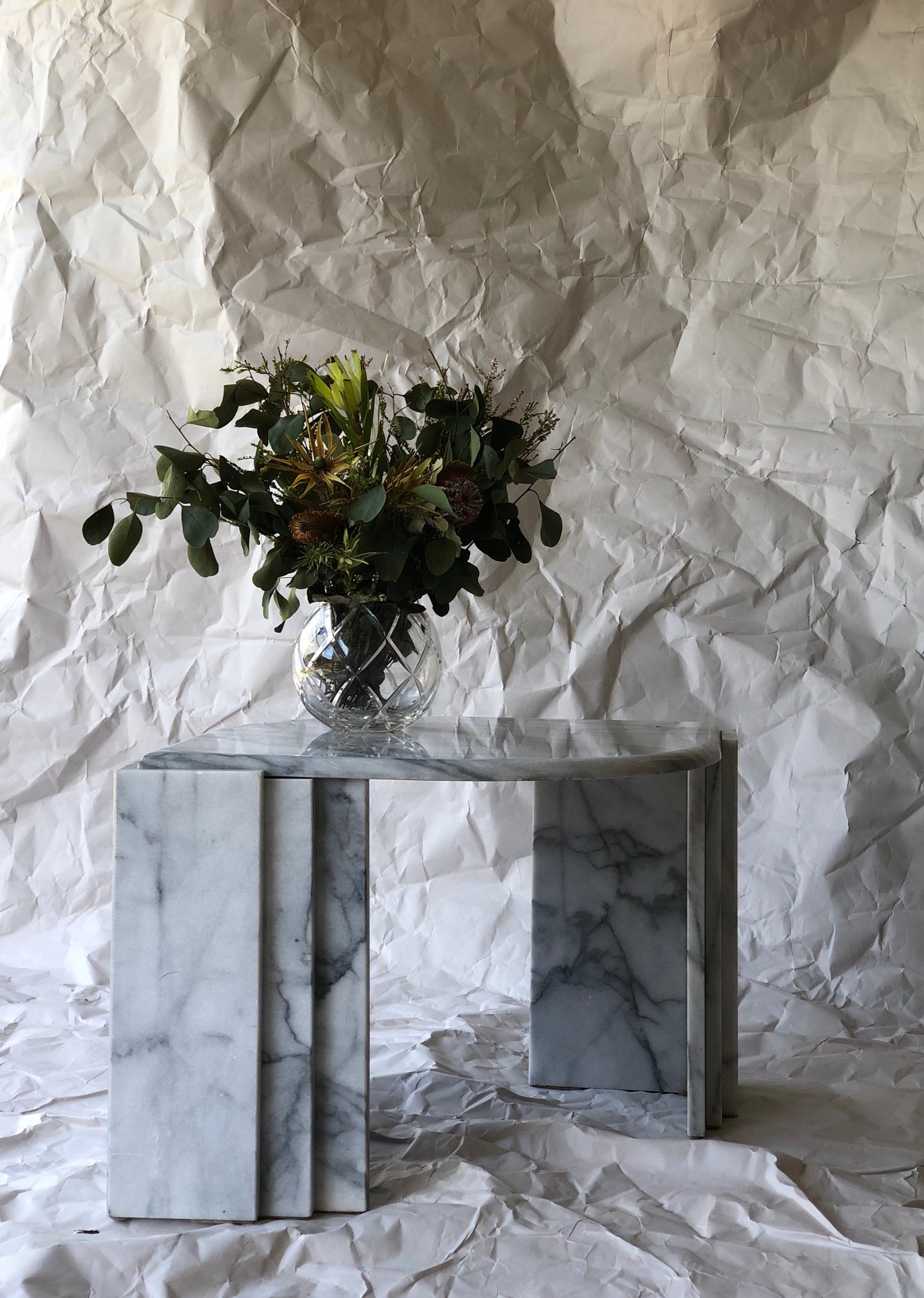 Polished Carrara marble side table