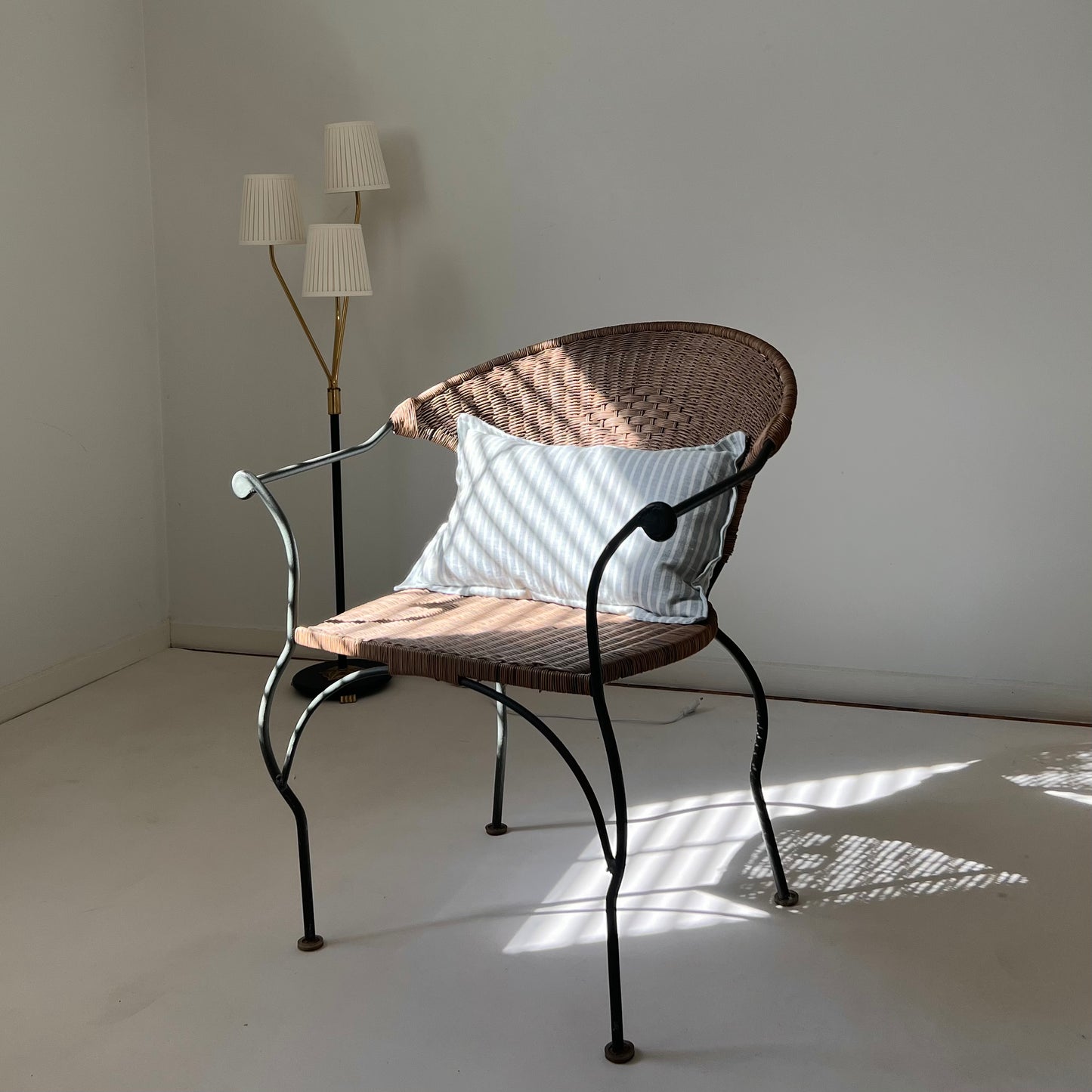 - Curvy Iron and Cane Armchair