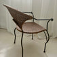 - Curvy Iron and Cane Armchair