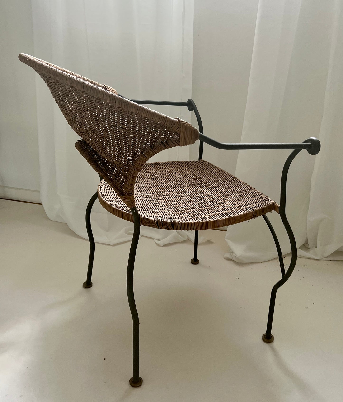 - Curvy Iron and Cane Armchair