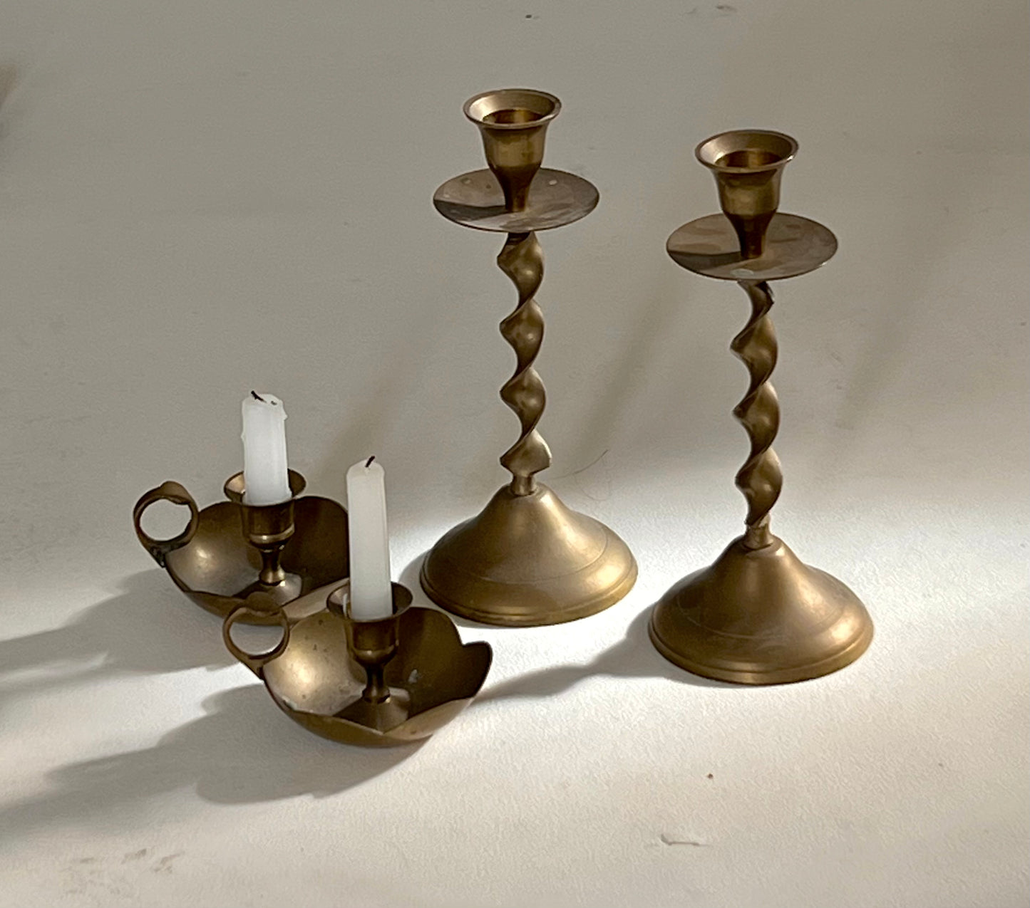 - Set of Four Antique Brass Candle Holders