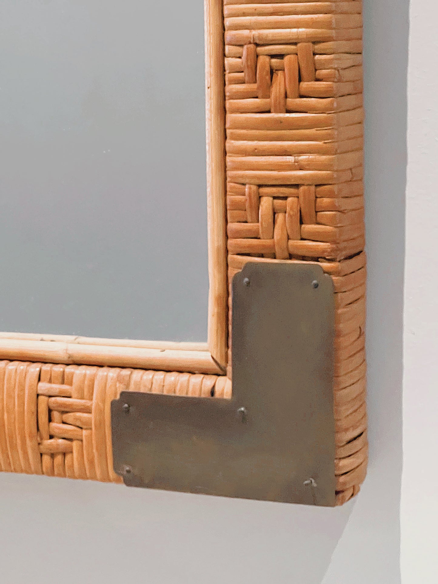 Cane & brass mirror