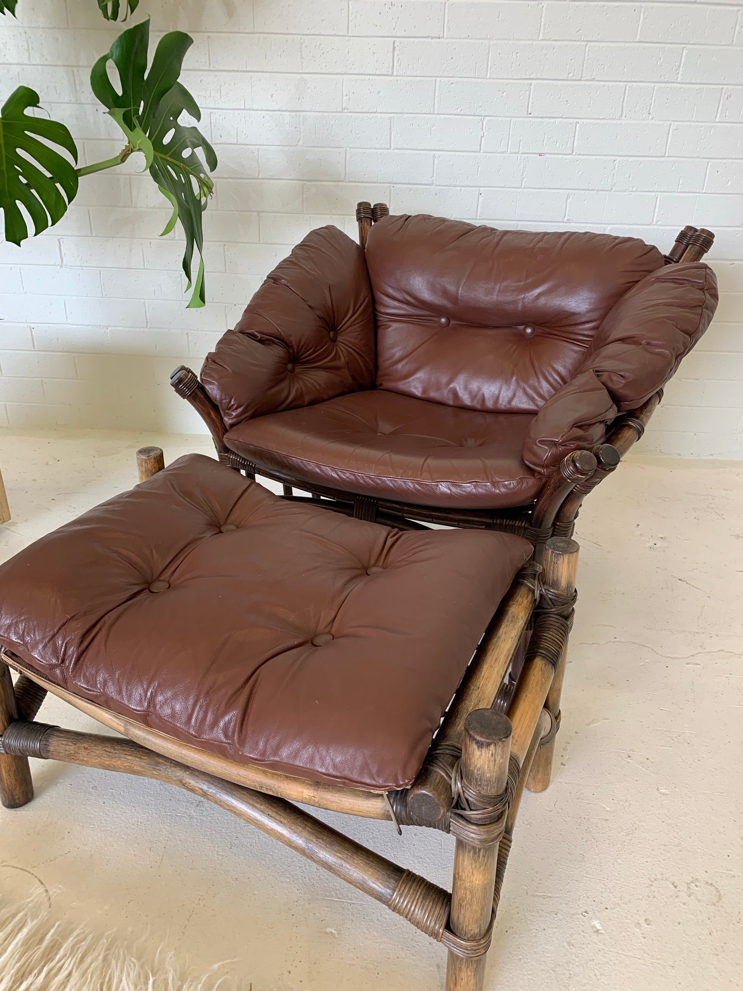 Vintage Cane and Leather Armchair + Ottoman