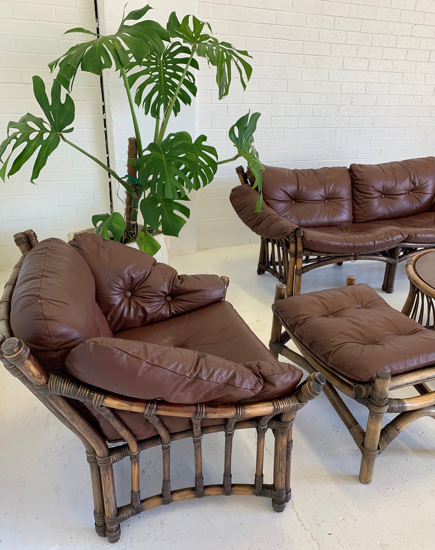 Vintage Cane and Leather Armchair + Ottoman