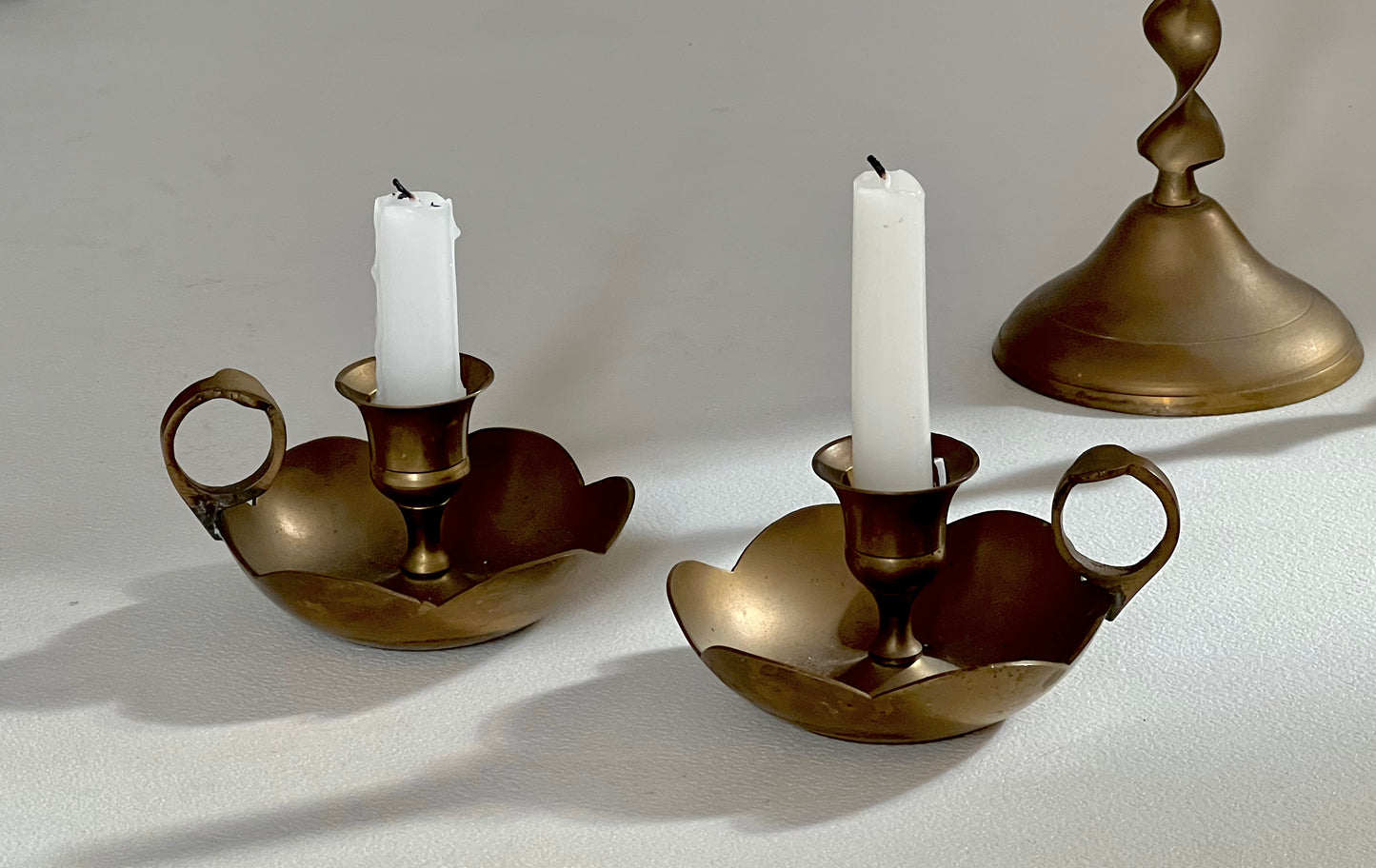 - Set of Four Antique Brass Candle Holders