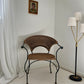 - Curvy Iron and Cane Armchair