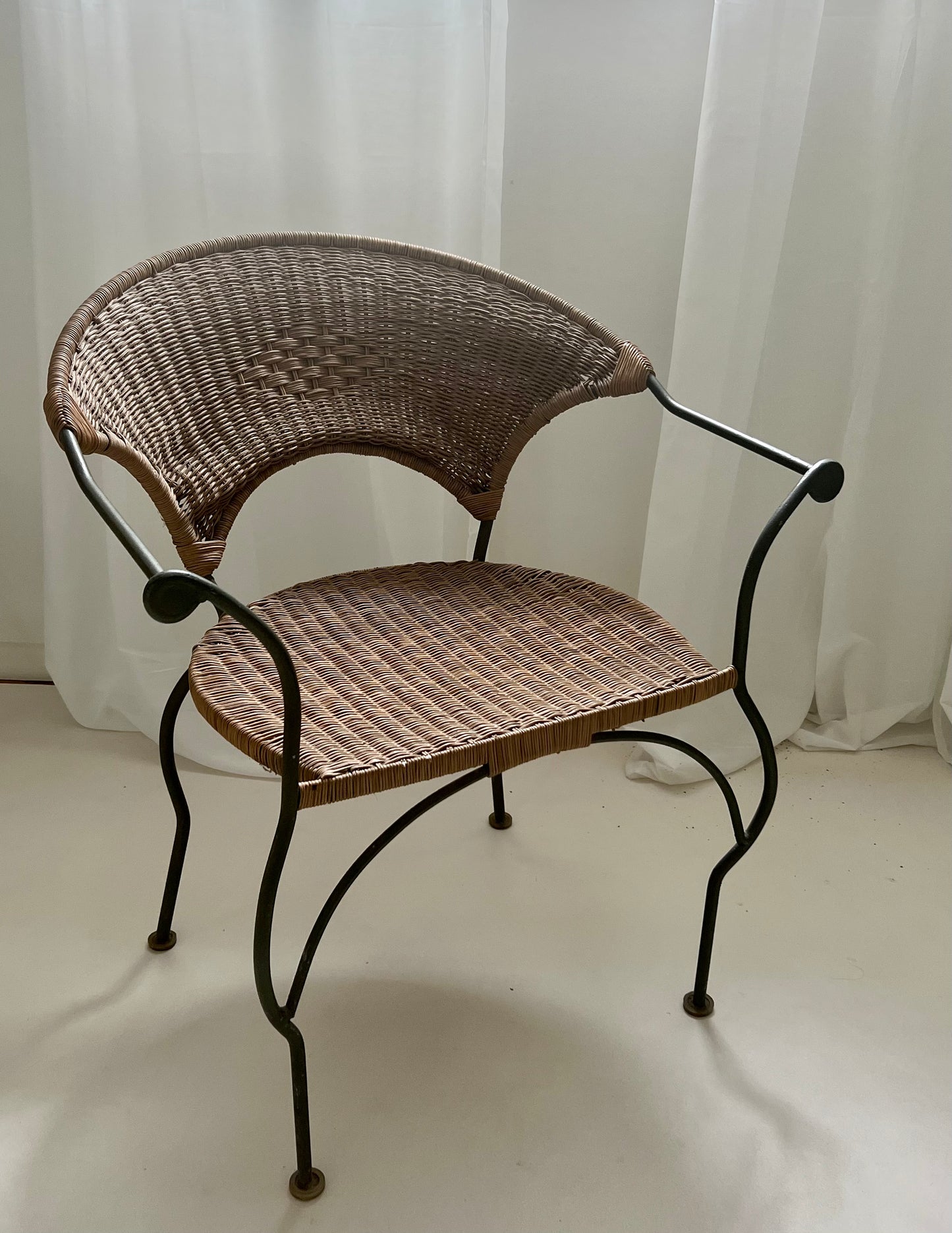 - Curvy Iron and Cane Armchair