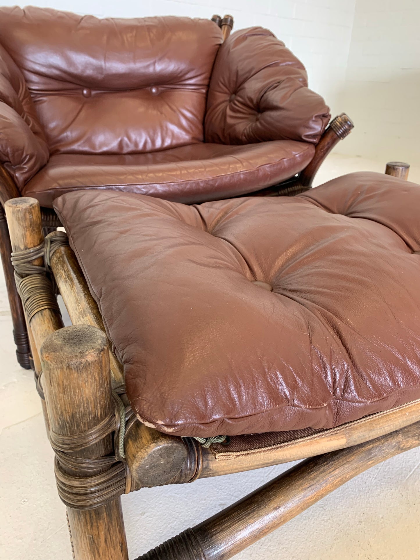 Vintage Cane and Leather Armchair + Ottoman