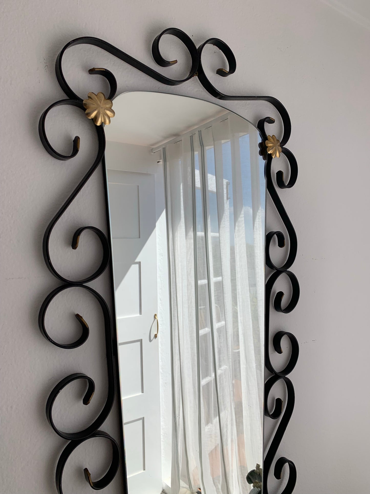 French Curved Iron and Brass Mirror