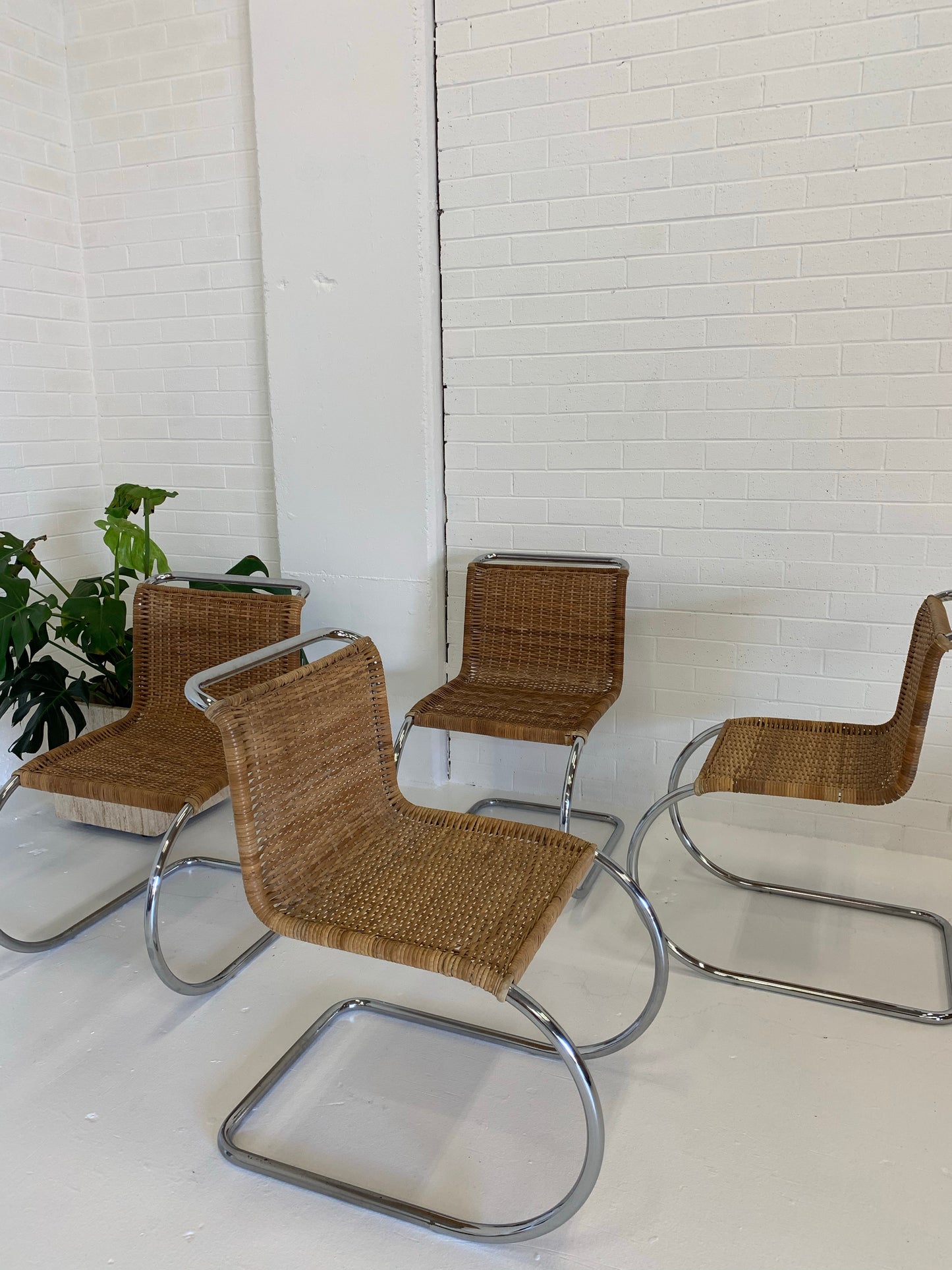 Vintage Cantilever Wicker and Chrome Dining Chairs