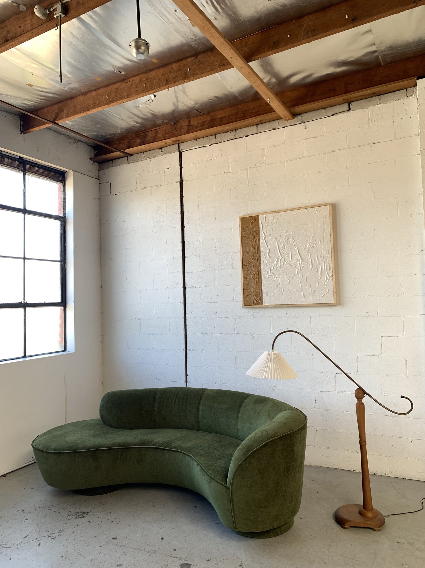 Curved Velvet Sofa in Deep Botanical Green