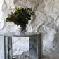 Polished Carrara marble side table