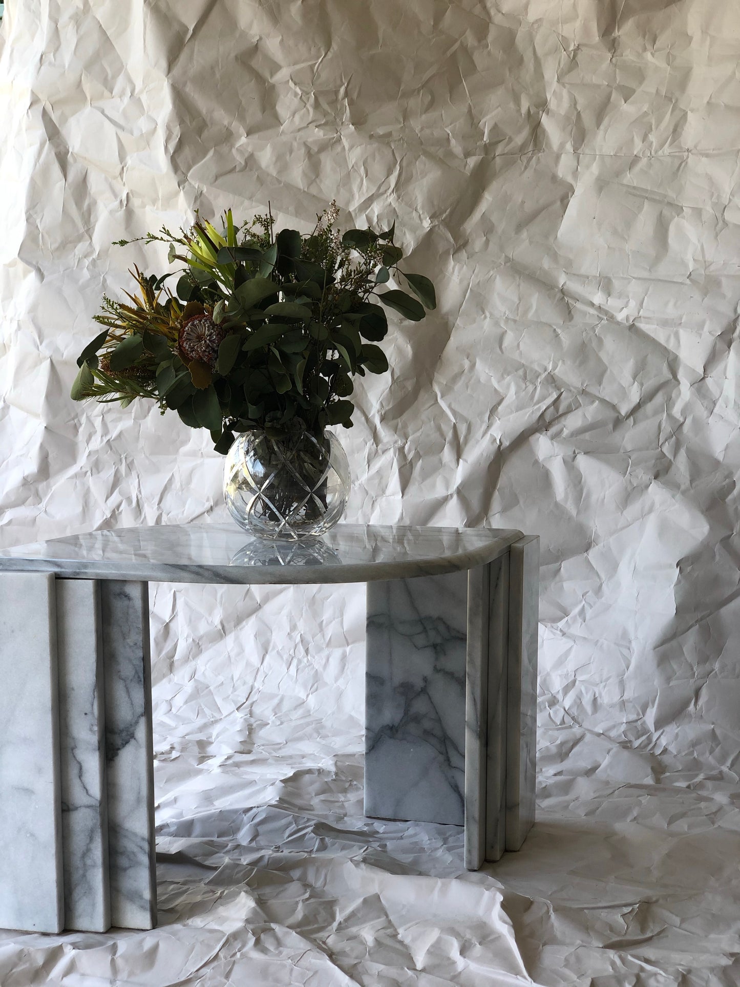 Polished Carrara marble side table