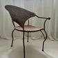 - Curvy Iron and Cane Armchair