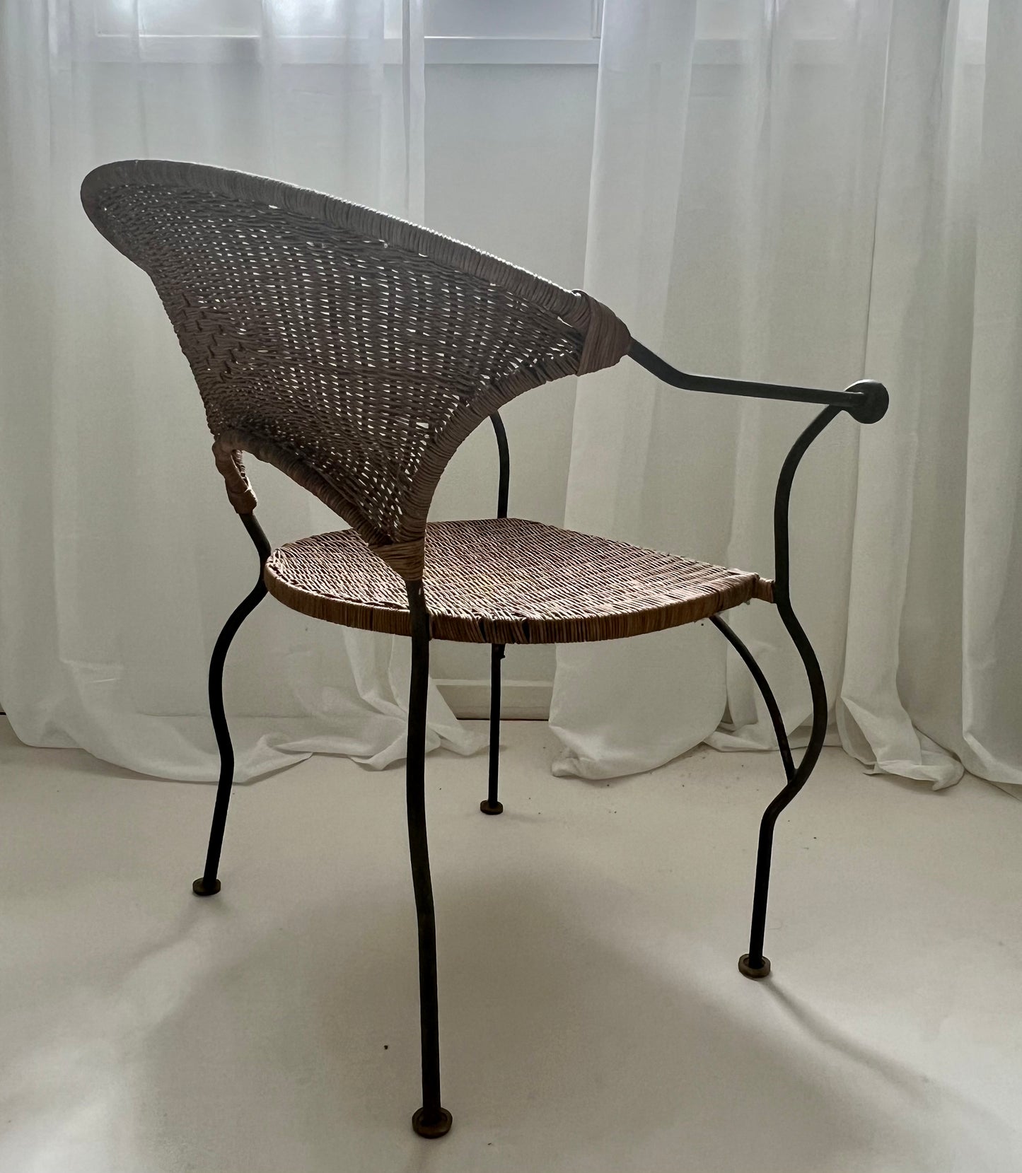 - Curvy Iron and Cane Armchair