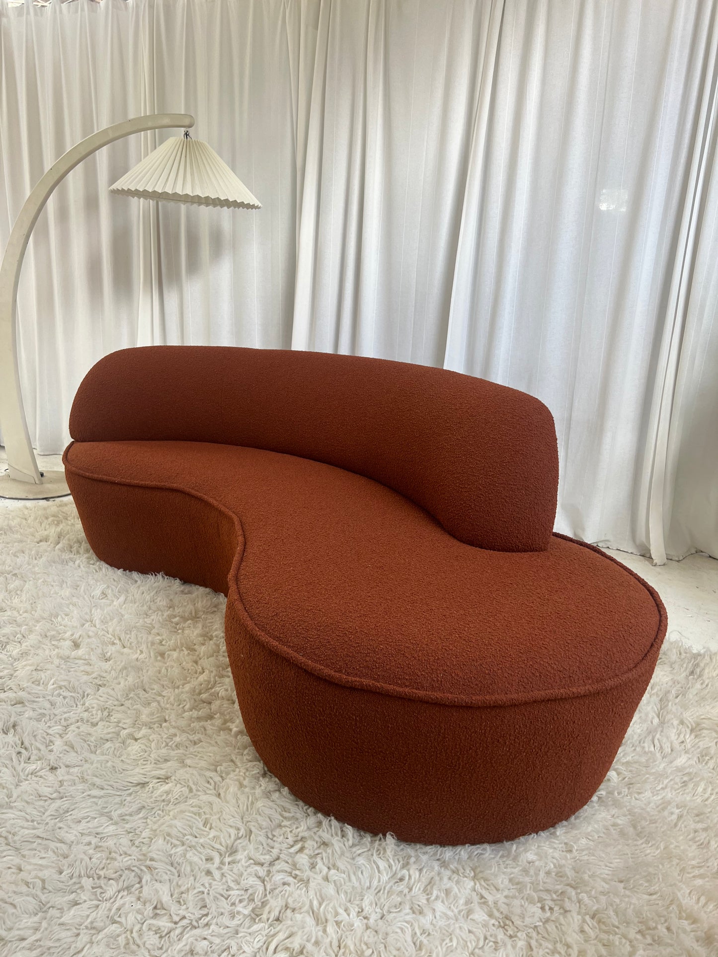 - Bespoke Rust Boucle Curved Sofa