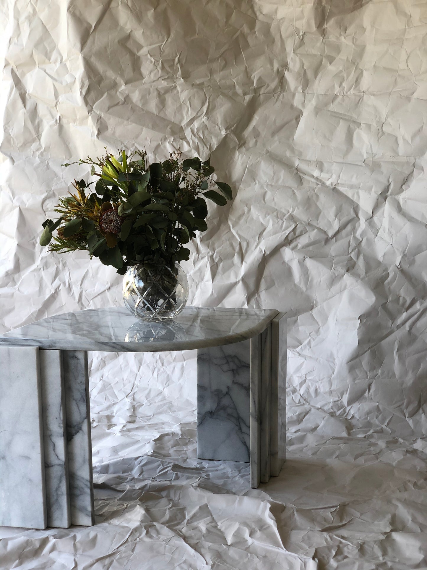 Polished Carrara marble side table