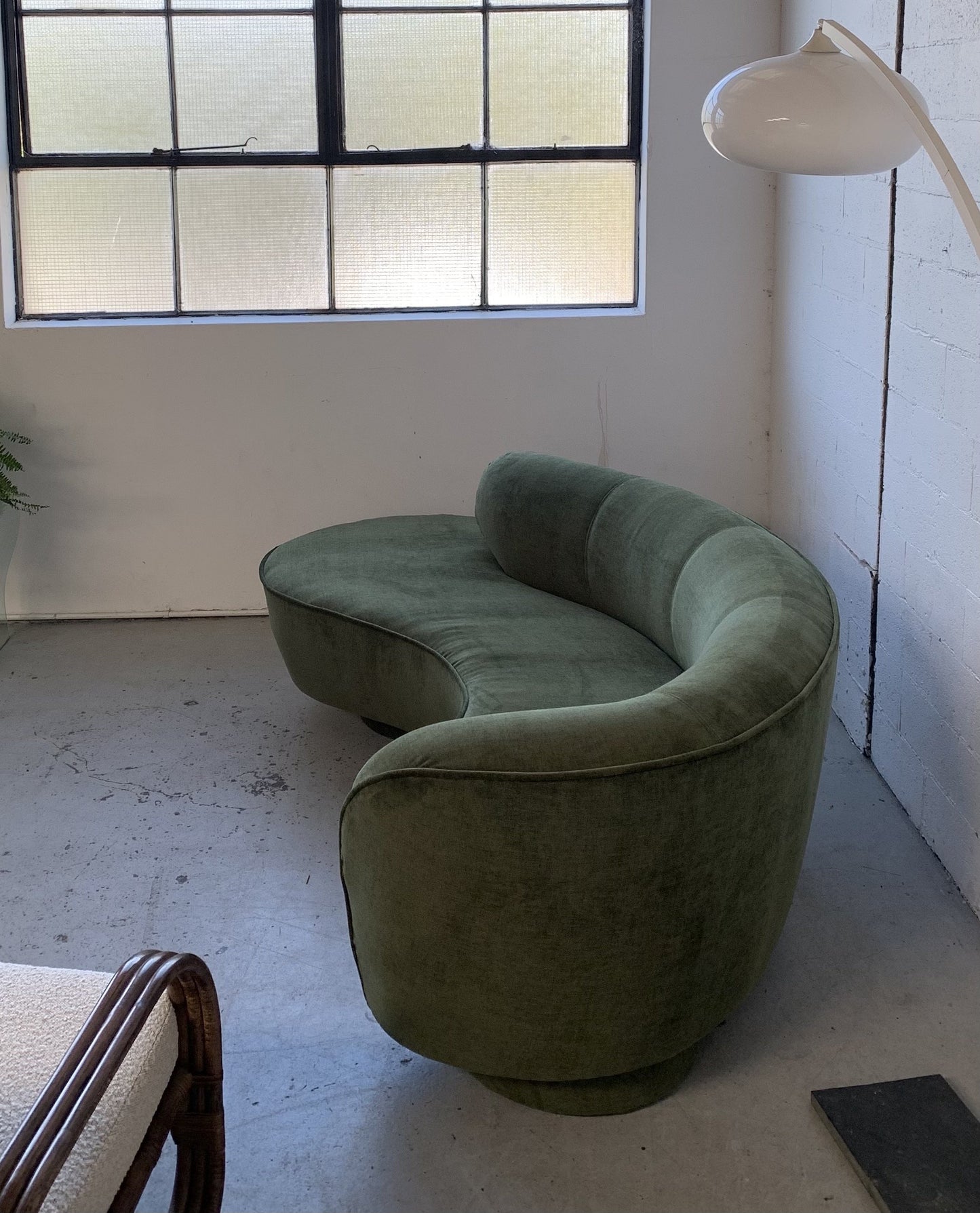 Curved Velvet Sofa in Deep Botanical Green