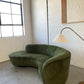Curved Velvet Sofa in Deep Botanical Green