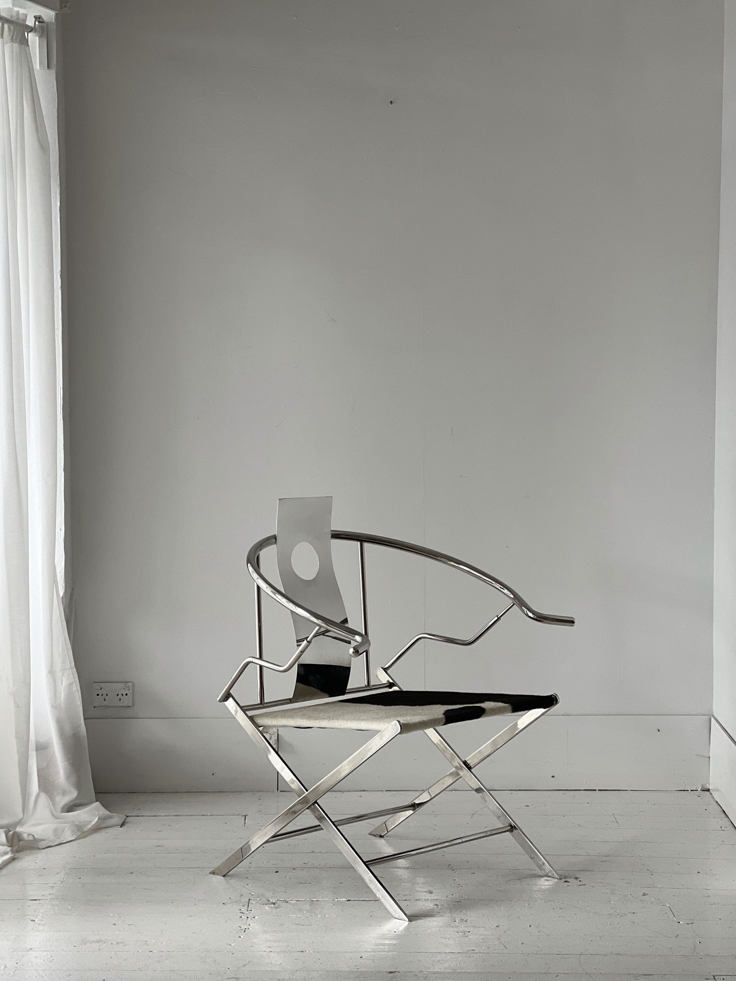 Chrome & Cow-Hide Lounge Chair