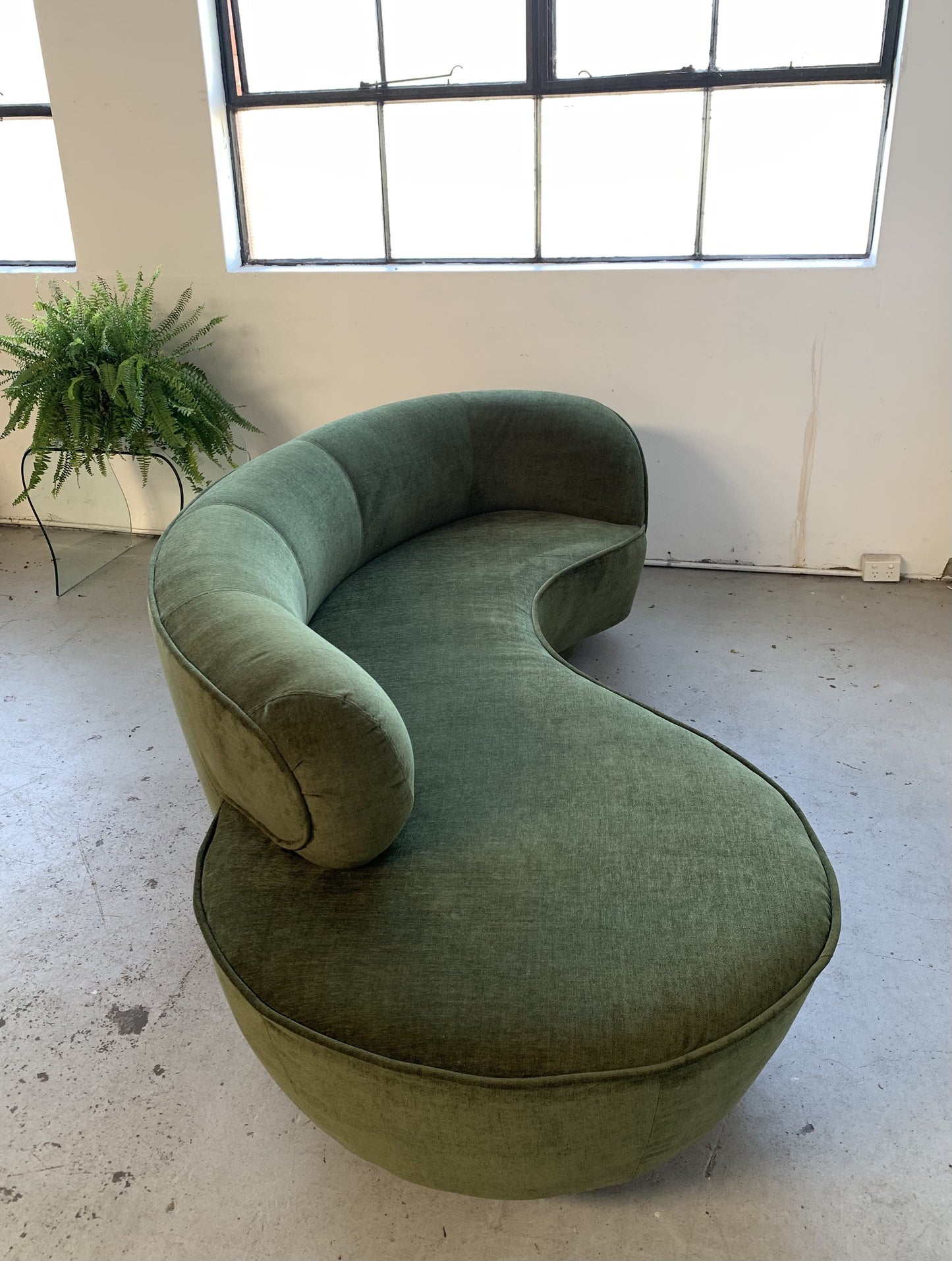 Curved Velvet Sofa in Deep Botanical Green