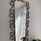 French Curved Iron and Brass Mirror