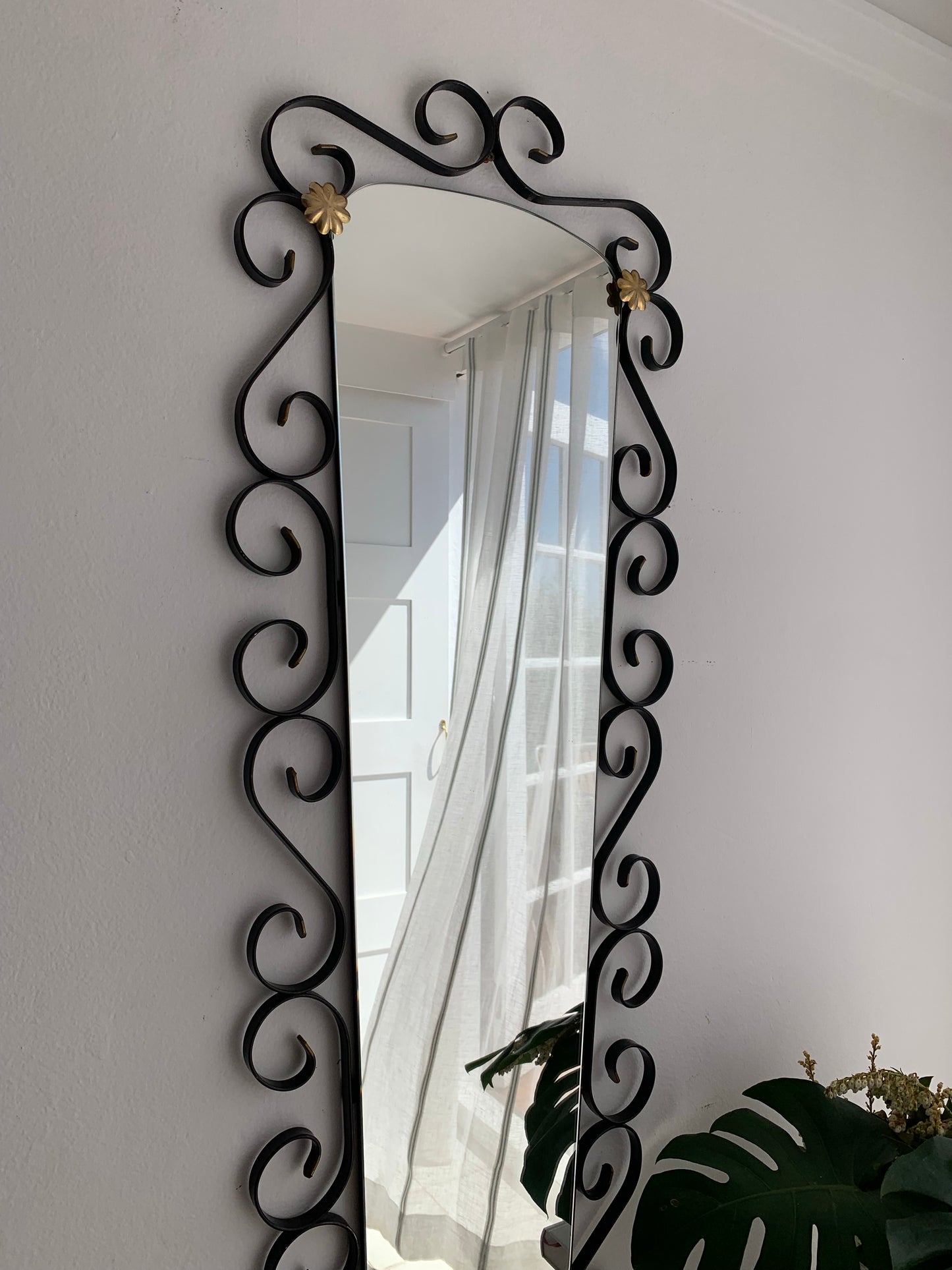 French Curved Iron and Brass Mirror